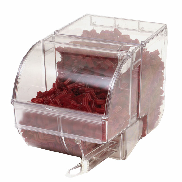 A photo of a scoop bin with candy inside.