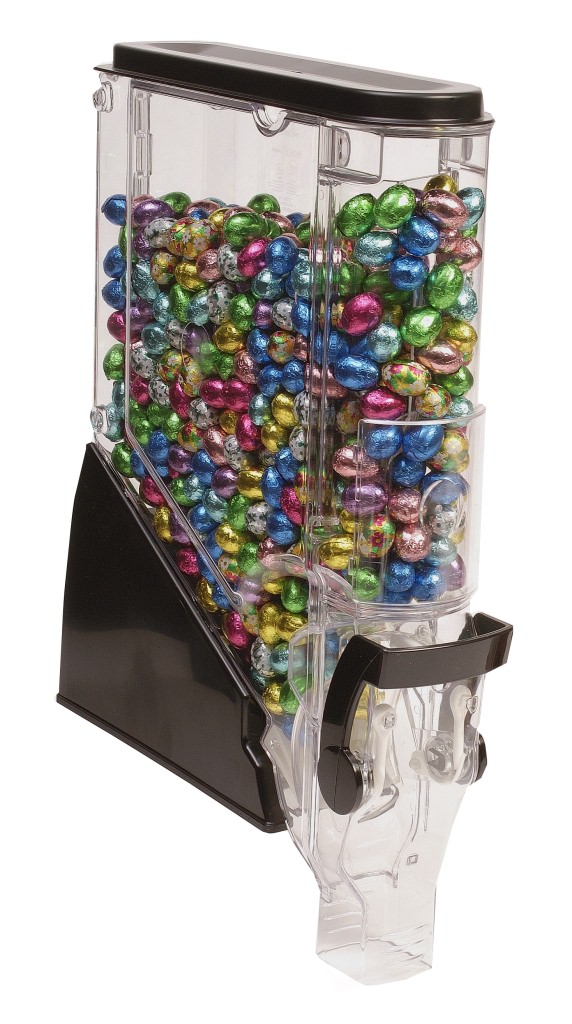 A photo of a gravity bin with candy inside.